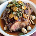 Tender Slow-Roasted Lamb Shoulder Glazed with Rosemary, Garlic, and Honey